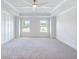 Open, airy bedroom with ceiling fan and double windows at 4191 Hosch Reserve Dr, Buford, GA 30519