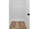 Efficiently designed closet with hardwood floors, electrical outlet, and ample storage space at 4191 Hosch Reserve Dr, Buford, GA 30519