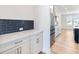 Gourmet kitchen with custom cabinetry, subway tile backsplash, and stainless steel appliances at 4191 Hosch Reserve Dr, Buford, GA 30519