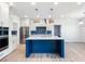 Beautiful kitchen with an island, modern stainless steel appliances, and stylish pendant lighting at 4191 Hosch Reserve Dr, Buford, GA 30519