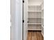 Walk-in pantry with custom shelving providing lots of storage space at 4191 Hosch Reserve Dr, Buford, GA 30519