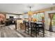 Charming dining area with stylish table set and lots of sunlight at 423 Blackbird Way, Hampton, GA 30228