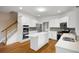 Bright kitchen featuring stainless appliances, island, and ample counter space at 1382 Benbrooke Nw Ln, Acworth, GA 30101