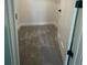 Bright walk-in closet featuring modern neutral carpet and trim at 171 Silvercrest Dr, Acworth, GA 30101