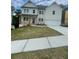 Charming two-story home with white siding, a covered porch, and a two-car garage at 171 Silvercrest Dr, Acworth, GA 30101