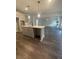 Inviting living space showcases modern kitchen with large island at 171 Silvercrest Dr, Acworth, GA 30101