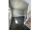 Bright living room with large windows, hardwood floors, and a staircase at 171 Silvercrest Dr, Acworth, GA 30101