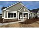 Charming new construction home with modern architecture, manicured lawn and inviting entrance at 1802 Bonica Xing # 1802, Cumming, GA 30040