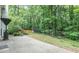 Backyard with a patio and a wooded area at 2022 Maple Ridge Nw Dr, Acworth, GA 30101