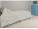 Cozy bedroom with a white bed, a blue dresser, and neutral carpet at 2022 Maple Ridge Nw Dr, Acworth, GA 30101