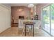 Cozy dining area with a table and chairs adjacent to the living room at 2022 Maple Ridge Nw Dr, Acworth, GA 30101