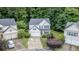 Inviting two-story home with a two-car garage and beautiful landscaping in a wooded neighborhood at 2022 Maple Ridge Nw Dr, Acworth, GA 30101