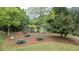 Charming community picnic area with multiple tables and lush green surroundings at 2022 Maple Ridge Nw Dr, Acworth, GA 30101