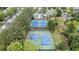 Aerial view of community tennis courts surrounded by trees at 2022 Maple Ridge Nw Dr, Acworth, GA 30101