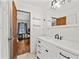 Bathroom showcasing a white vanity with a white countertop and modern black faucet at 61 Sherwood Se Ln, Marietta, GA 30067