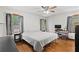Cozy bedroom featuring hardwood floors, natural light, and neutral decor at 61 Sherwood Se Ln, Marietta, GA 30067