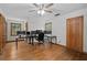 Office space featuring a large window, hardwood floors, and multiple computer monitors at 61 Sherwood Se Ln, Marietta, GA 30067