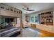 Cozy bedroom featuring a bunk bed and built-in shelving with a window seat offering ample natural light at 305 Montevallo Dr, Atlanta, GA 30342