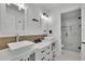 Modern bathroom with double vanities and a glass-enclosed shower at 3165 Brookview Dr, Marietta, GA 30068