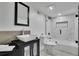 Contemporary bathroom featuring a vessel sink and sleek shower with modern tile at 3165 Brookview Dr, Marietta, GA 30068