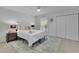 Bright bedroom featuring a ceiling fan, plush rug, and closet at 3165 Brookview Dr, Marietta, GA 30068