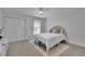 Serene bedroom with soft carpet, modern ceiling fan and generous closet at 3165 Brookview Dr, Marietta, GA 30068