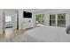 Bright bedroom with en suite bathroom access and a private balcony overlooking the yard at 3165 Brookview Dr, Marietta, GA 30068