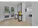 Basement entryway with double doors leading to patio and view of bedroom through doorway at 3165 Brookview Dr, Marietta, GA 30068