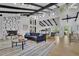 Spacious living room featuring a stone fireplace, vaulted ceilings, and large windows at 3165 Brookview Dr, Marietta, GA 30068