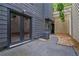 The side patio shows easy access to home systems and utilities and is well-secured and maintained at 3165 Brookview Dr, Marietta, GA 30068