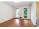 Empty bedroom with hardwood floors and two windows at 3916 Ridgewood Se Dr, Smyrna, GA 30080