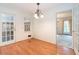 A light-filled breakfast nook boasts wooden floors and lots of natural light from many windows at 3916 Ridgewood Se Dr, Smyrna, GA 30080