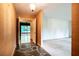 The foyer boasts wallpapered walls and a unique slate floor entryway into another room at 3916 Ridgewood Se Dr, Smyrna, GA 30080