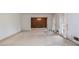 Spacious living room with white walls, a chandelier and vintage draperies and carpet at 3916 Ridgewood Se Dr, Smyrna, GA 30080