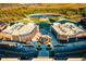 Aerial view of a well designed mixed use development with commercial real estate, outdoor park, and water feature at 4850 Summerchase Ln, Cumming, GA 30028
