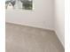 Bedroom featuring carpeted floors and a window for natural light at 648 Kimberwick Dr, Locust Grove, GA 30248