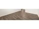 Bedroom featuring hardwood floors, white trim and an entrance doorway at 648 Kimberwick Dr, Locust Grove, GA 30248