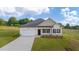 Charming single-story home with a well-manicured lawn and attached garage in a desirable location at 648 Kimberwick Dr, Locust Grove, GA 30248