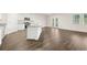 Open-concept kitchen featuring a granite island and stainless steel appliances at 648 Kimberwick Dr, Locust Grove, GA 30248