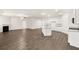 Expansive open-concept living area with fireplace and modern kitchen at 648 Kimberwick Dr, Locust Grove, GA 30248