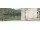 Window with the green trees in the background at 648 Kimberwick Dr, Locust Grove, GA 30248