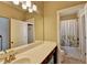 Clean bathroom with a large mirror, vanity, and shower-tub combination at 12095 Cameron Dr, Duluth, GA 30097