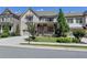 Charming two-story home with stone accents, covered porch, and well-manicured landscaping at 12095 Cameron Dr, Duluth, GA 30097