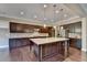 Updated kitchen featuring a spacious island, stainless steel appliances, and ample cabinet space at 12095 Cameron Dr, Duluth, GA 30097