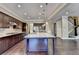 Modern kitchen featuring a large island, stainless steel appliances, and hardwood floors at 12095 Cameron Dr, Duluth, GA 30097