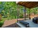 Spacious backyard featuring mature trees and multiple levels of outdoor living space at 1667 Wehunt Se Pl # 11, Smyrna, GA 30082