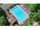Aerial photo of large community pool with lounge chairs and shade structures at 2678 Adair Trl, Dacula, GA 30019