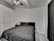 This bedroom is well lit and has a ceiling fan and a calming paint color at 2678 Adair Trl, Dacula, GA 30019
