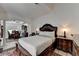 Well-lit bedroom features a dining room beyond an archway at 2678 Adair Trl, Dacula, GA 30019