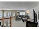 Open living room with lots of natural light and comfortable seating at 2678 Adair Trl, Dacula, GA 30019